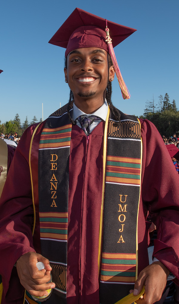 smiling male grad