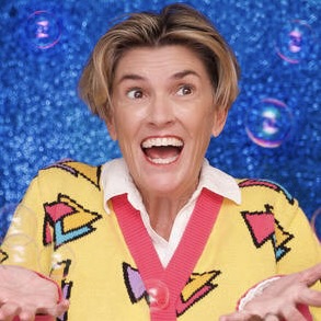 jere chang wearing yellow sweater and surrounded by bubbles