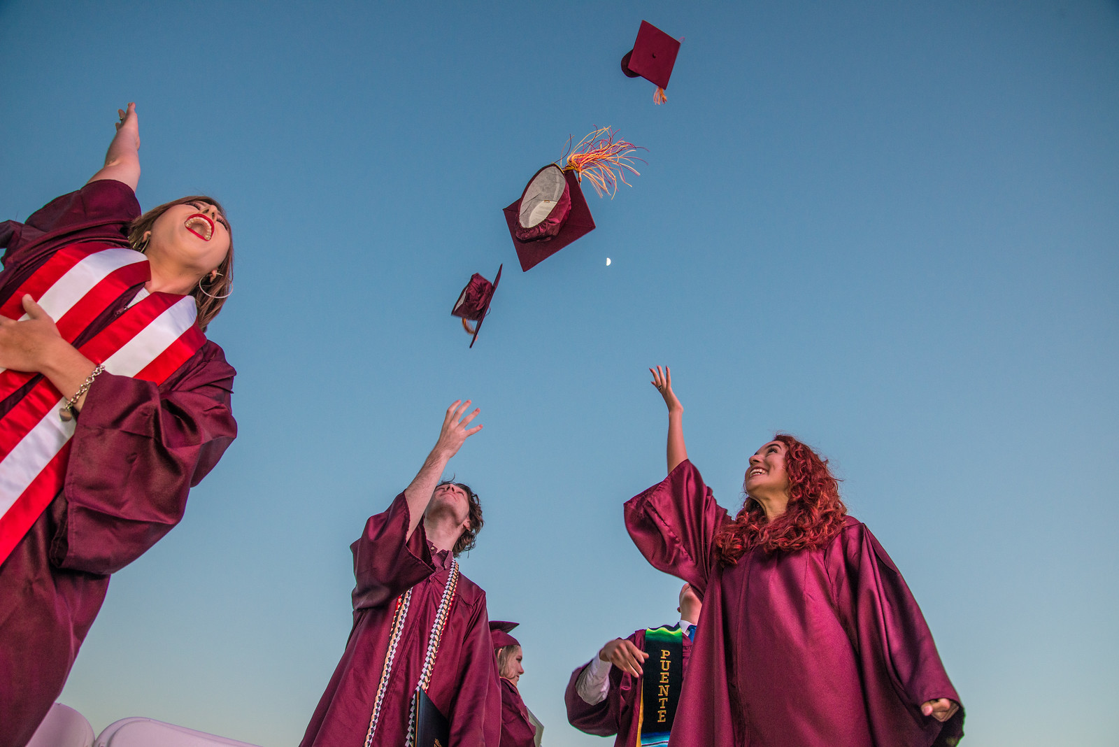 grads tossing caps