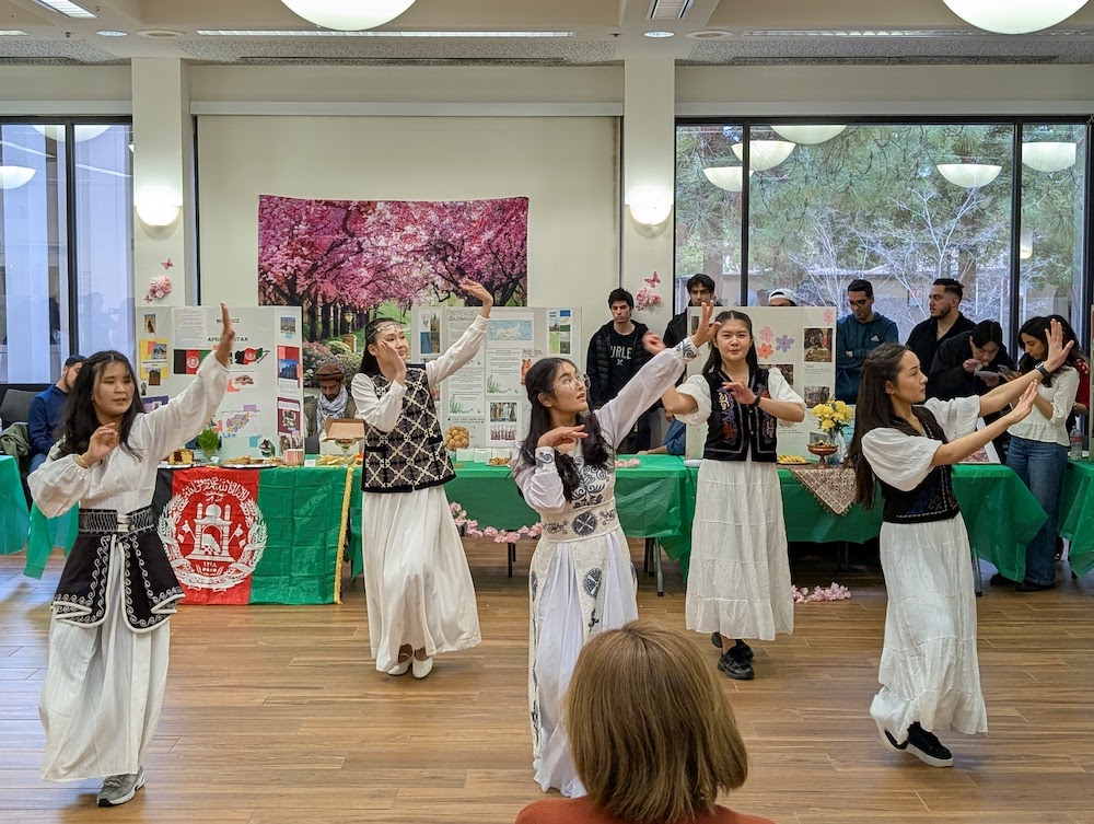 young women in white dancing