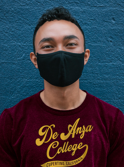 student with mask and De Anza t-shirt