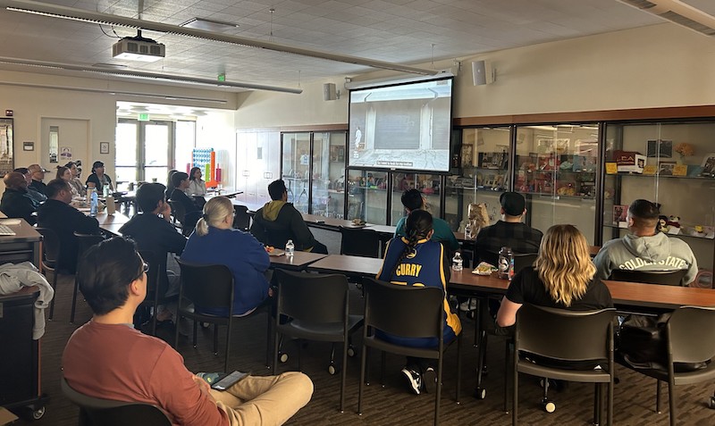 group watching film screening in Multicultural Center