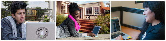 three students with laptops